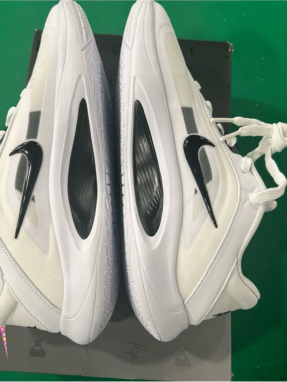 Nike Kids White Sneakers with Black Swoosh Accent